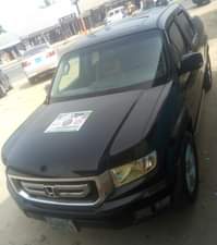 A picture of Honda Ridgeline 2011 Model Colour Black Condition No pin missing