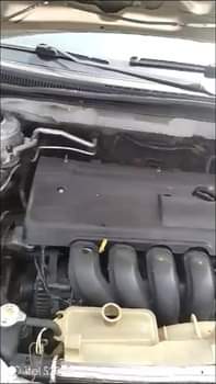 A picture of Toyota Corolla 2004 model Straight body Engine has slight top