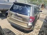 A picture of subaru forester gold