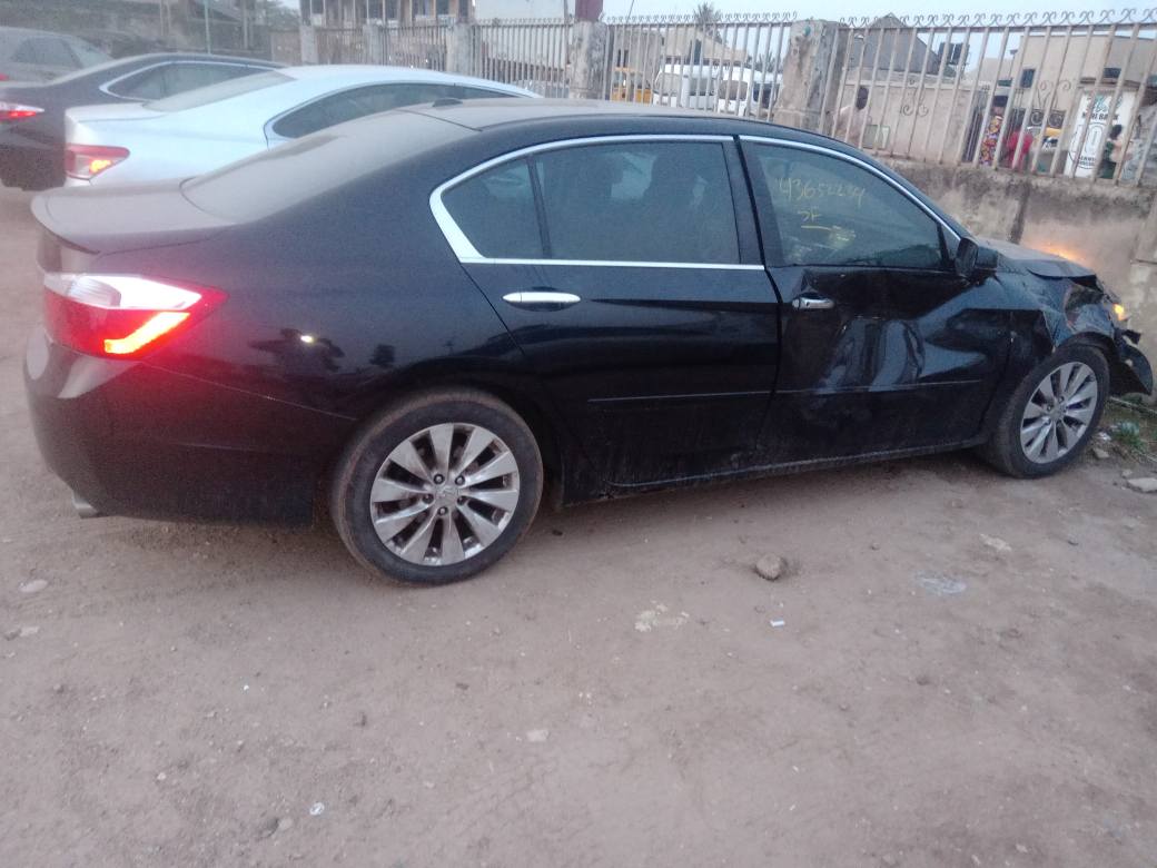 A picture of 2015 KEYLESS HONDA ACCORD SPORTS with slight accidental scratches to