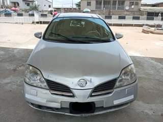 A picture of WAGON USED BY A LADY 2005 NISSAN PRIMERA WITH REVERSE