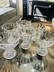 A picture of Glass vessels chairs and pasi table