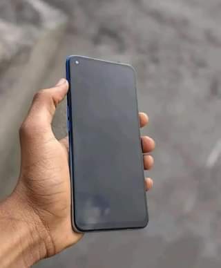 A picture of Oppo a54 storage 64 4gb bei 170 000tshs side finger