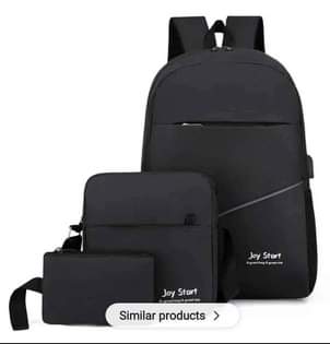 A picture of laptop and school backpack bags