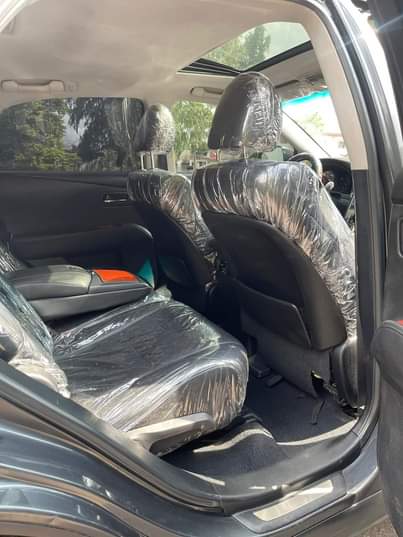 A picture of registered make lexus model rx350 condition ac chilling engine gear