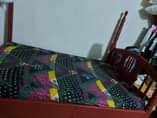 A picture of New Phone and few months used bed