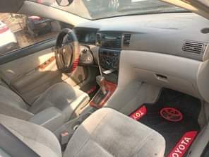 A picture of 2004 TOYOTA COROLLA FOR SALE BELGIUM STANDARD AC IS CHILLING