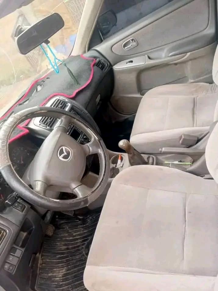 A picture of Fast fingers money needed asap Mazda 626 lift back tokunbo