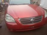 A picture of Very neat used Nissan Altima 4 plugs