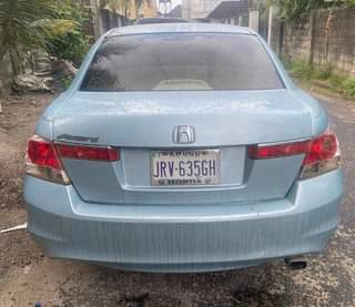 A picture of 4 plugs Honda Accord 2010 model