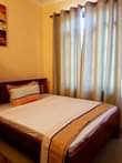 A picture of 1bedroom living room and kitchen at mikocheni