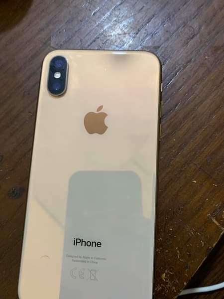 A picture of iPhone XS spare Screen and battery call me 256753208072