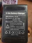 A picture of Godox charger betri SOMA MAELEZO