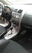 A picture of 2009 Toyota corolla with sound engine and gear chilling ac