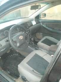 A picture of 2003 model Toyota Corolla bank type