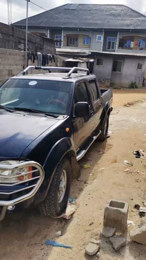 A picture of Give me 2 5m and take it Nissan pick up