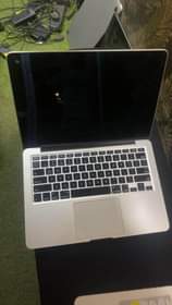 A picture of MacBook Pro 2015 8gb Ram 128ssd Keyboard Light