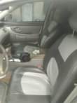 A picture of 2003 Toyota Avalon dashboard first body 1 year old the