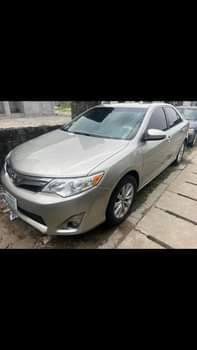 A picture of Toyota Camry 2014 015 model everything working perfectly okay Engine