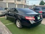 A picture of Clean REGISTERED camry 2010 Neatly used First body Black colour