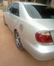 A picture of Toyota Camry 06 Gear engine interior Android screen and reverse