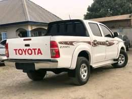 A picture of PRE OWNED Super Clean 2014 Barely Driven Toyota Hilux With