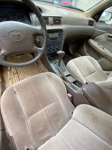 A picture of Toyota Camry Envelope Good Engine and Gear AC need Gas