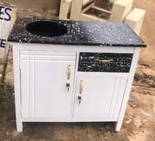 A picture of TV showkes kitchen cabinets