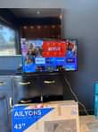 A picture of TV SMART TV NEW CONDITION