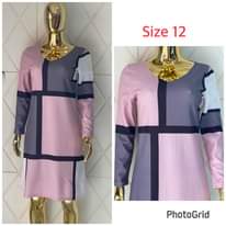 A picture of Office dresses at 45k each. 0706620111. Ntinda.