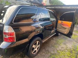 A picture of Registered 2003 Accura MDX quick sale 100 in and out