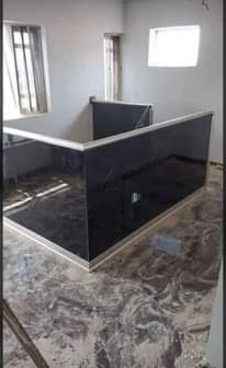 A picture of stainless steel frameless glass