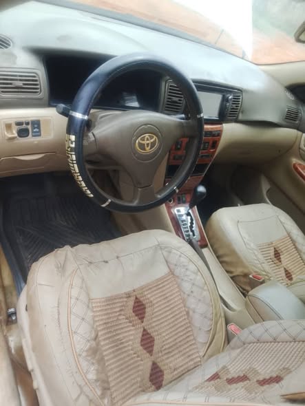A picture of 2003 Corolla with bad engine