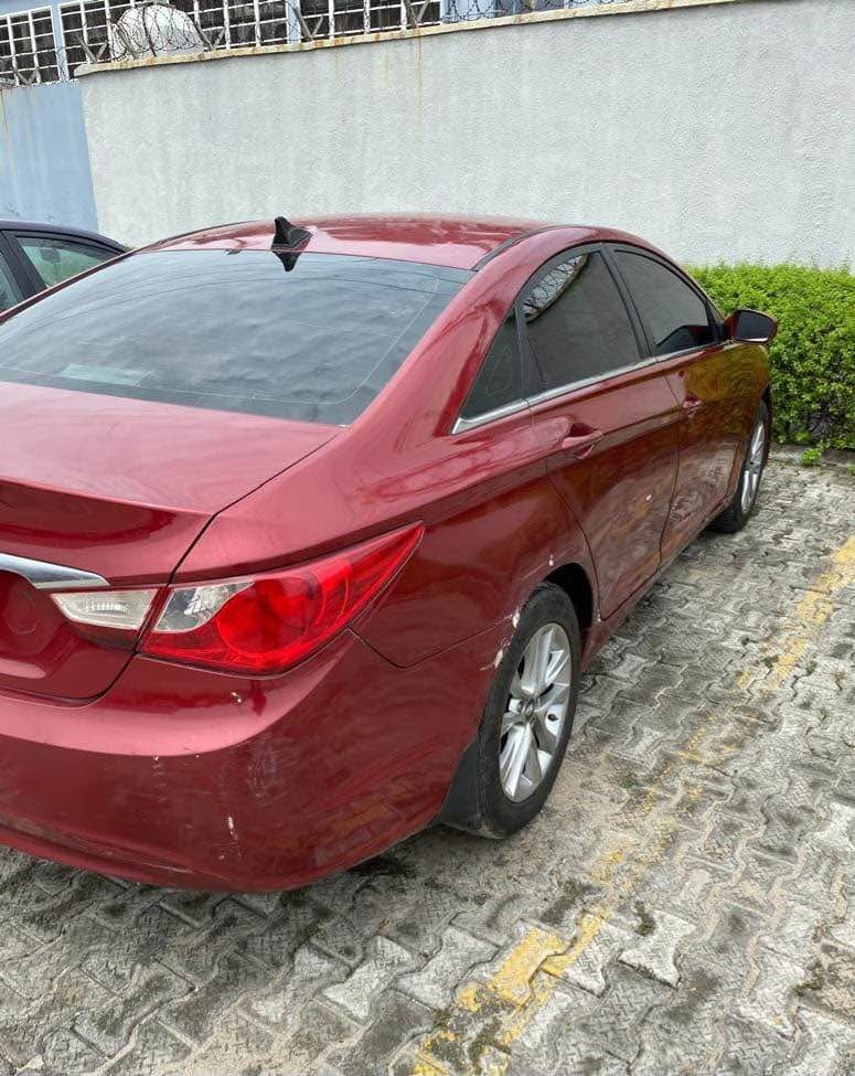 A picture of STILL AVAILABLE Clean Well Maintained Registered Red Hyundai Sonata 2012.
