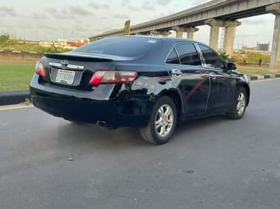 A picture of Clean 2009 Toyota Camry Toks engine and gear Chilling AC