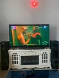 A picture of Hisense Smart TV 65 inches Price 220k LG Subwoofer 1250