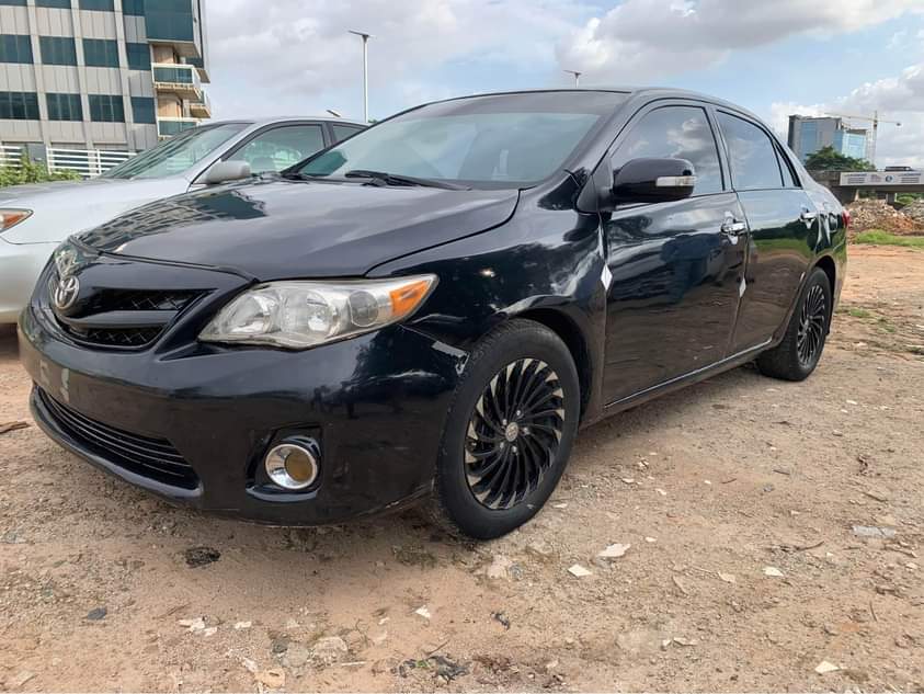 A picture of Distress 2011 Toyota Corolla buy and drive going for 5m