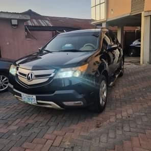 A picture of Extraordinary clean 2022 import Acura MDX 2008 model Registered but