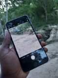 A picture of iphone 6s plus 64gb bh 71 inakaa na chaji Fingerprint