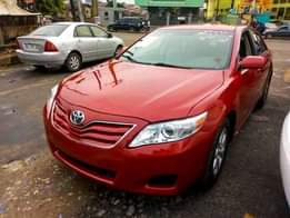 A picture of DISTRESS SALE 09163251827 DIRECT TOKUMBO TOYOTA CAMRY 2005 MODEL RED