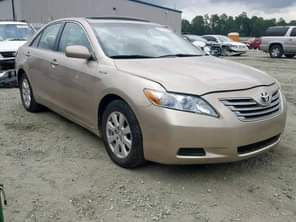 A picture of Nigeria custom services auctioning Cars bags of rice and vegetable