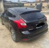 A picture of  Clean Nigerian Used Black Ford Focus 2014 First body.