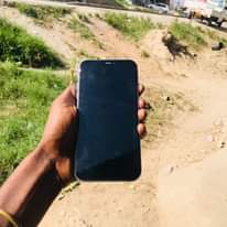 A picture of iPhone 11 plain 64gb Display Message Face ID 88 Cash