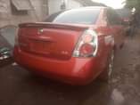 A picture of Very neat used Nissan Altima 4 plugs