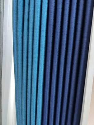 A picture of Curtains and rods