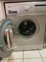 A picture of We fix broken electronic devices Tvs microwave plasma washing machine
