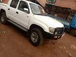 A picture of Toyota hillux Price 45m Diseal Location luzira 0770656750