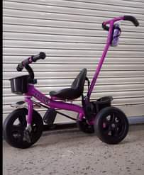 A picture of KIDS BIKES AND TOYS AVAILABLE IN DIFFERENT COLORS PRICE AND
