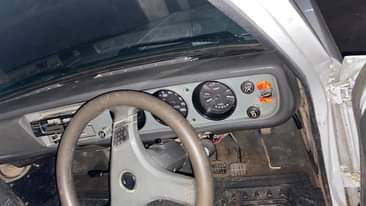A picture of Nissan 1400 on market sweet machine.