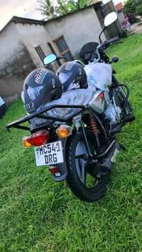 A picture of NAUZA BOXER BM 125 TSH 950 000 PIGA WHTSPP 0718702567